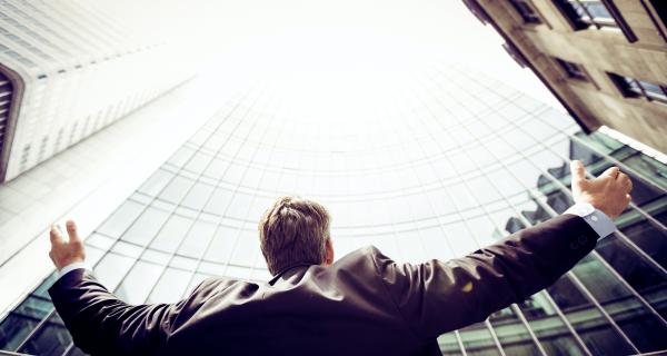 mentoring- man in suit arms 